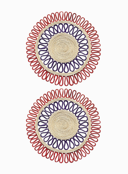 SET OF TWO MAGNOLIA PLACEMATS - Pair of large, hand woven raffia placemats in red and purple - two