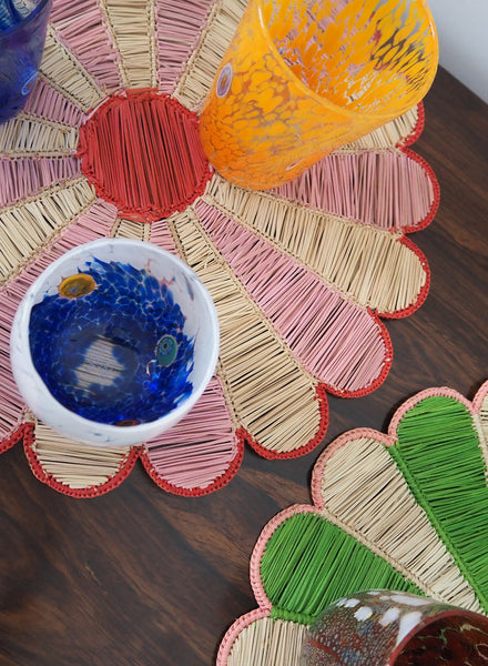 SET OF TWO MARGARITA PLACEMATS - Pair of large, hand woven raffia placemats in pink and red - Lifestyle