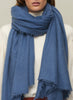 THE LUXE - Denim blue oversized pure cashmere knit wrap - Model