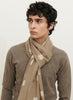 JANE CARR The Ikat Scarf in Taupe, taupe two tone pure cashmere woven scarf – male model 1