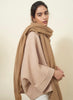 JANE CARR, THE LUXE - Camel oversized pure cashmere knit wrap - Model