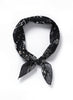JANE CARR The Ranch Neckerchief in Black, black printed cotton and silk-blend scarf – tied