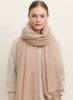 THE LUXE - Pale pink oversized cashmere knit wrap - model