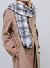 JANE CARR, THE PLAID SCARF - Monochrome checked wool and cashmere scarf - model