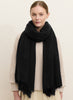 JANE CARR, THE LUXE - Black oversized cashmere knit wrap - model