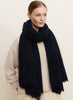 JANE CARR, THE LUXE - Navy oversized cashmere knit wrap - model