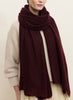 JANE CARR, THE LUXE - Burgundy oversized cashmere knit wrap - female model
