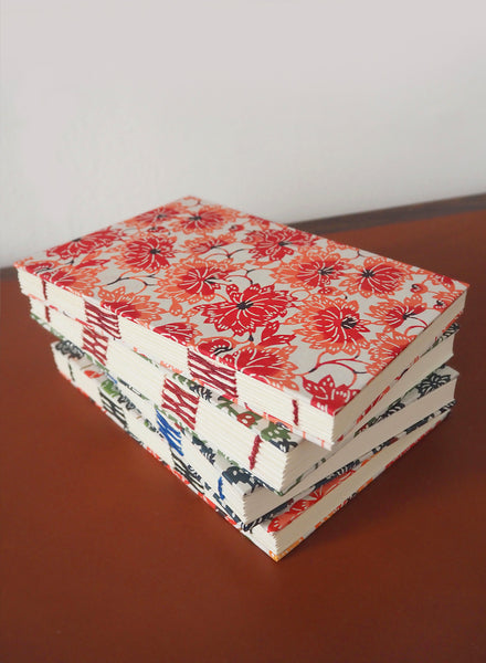 FOUR BESPOKE HAND STITCHED JAPANESE NOTEBOOKS - 1