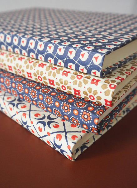 FOUR LARGE BESPOKE VARESE PAPER NOTEBOOKS - 1