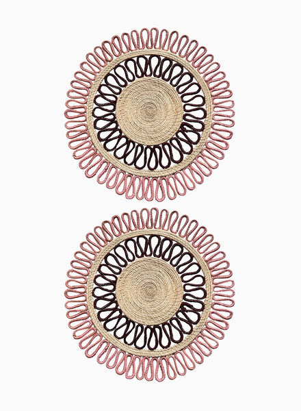 SET OF TWO MAGNOLIA PLACEMATS - Pair of large, hand woven raffia placemats in burgundy and pink - two