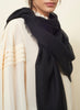 JANE CARR The Sheer Fray Square in Black, black super fine pure cashmere scarf - model