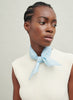 The Frutti Neckerchief, pale blue printed cotton silk-blend scarf – model 1