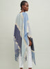 The Stripe Kaftan, blue fringed cashmere and linen kaftan - model